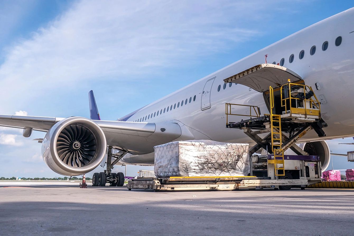Air cargo loading at Falcon Cargo hub – international freight forwarding services